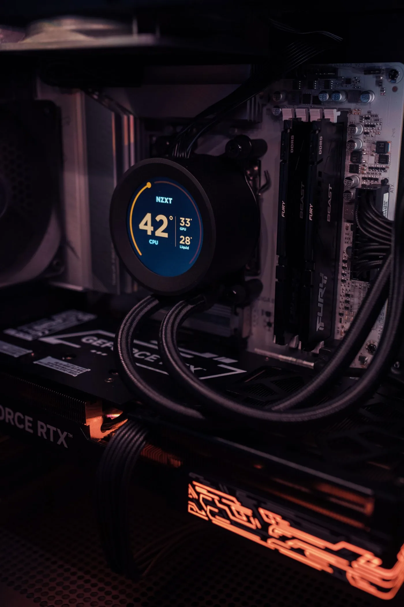 A liquid-cooled custom build with a temperature display on the pump cap